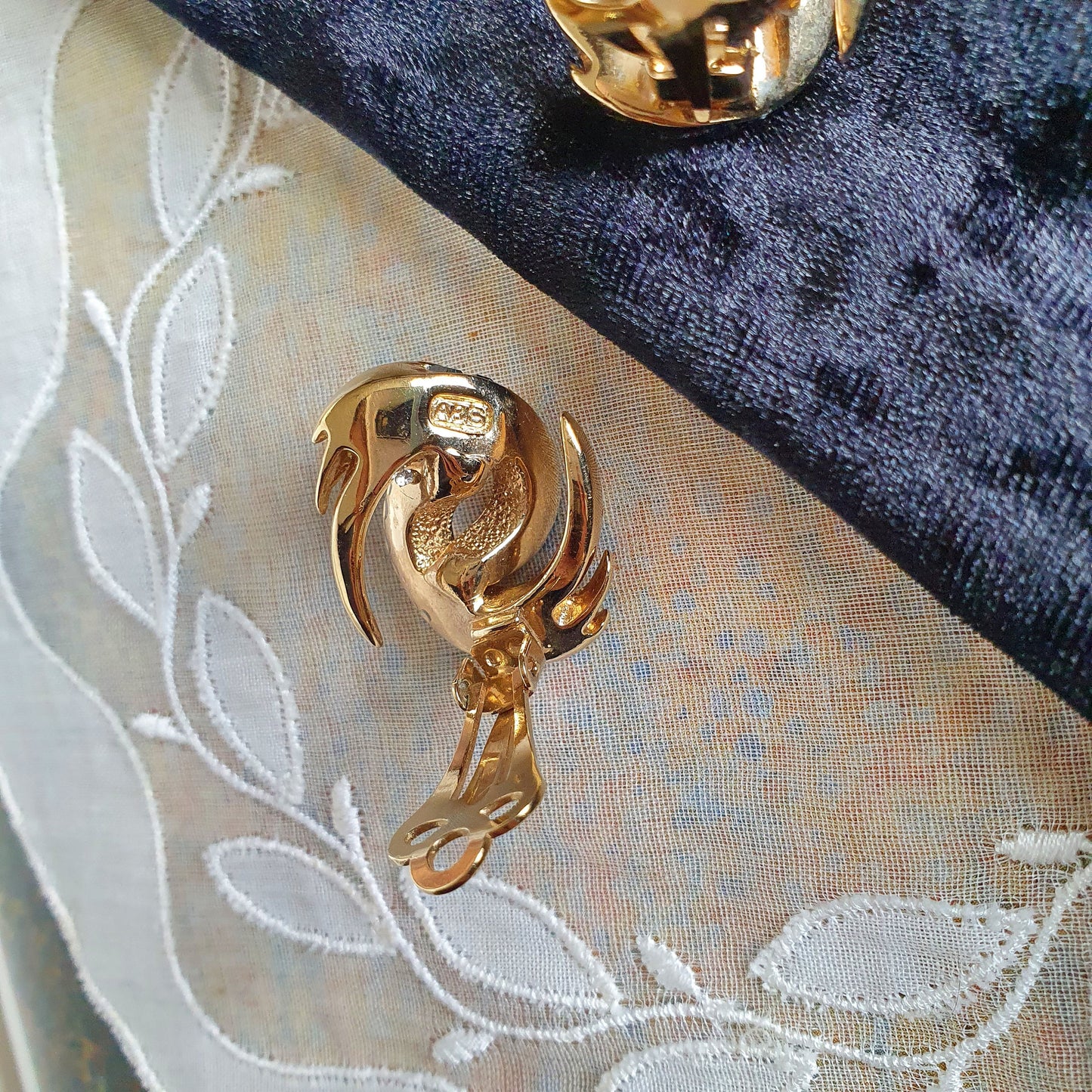 Clip on - Attwood and Sawyer Blue and Clear Crystals Swirl Clip On Earrings