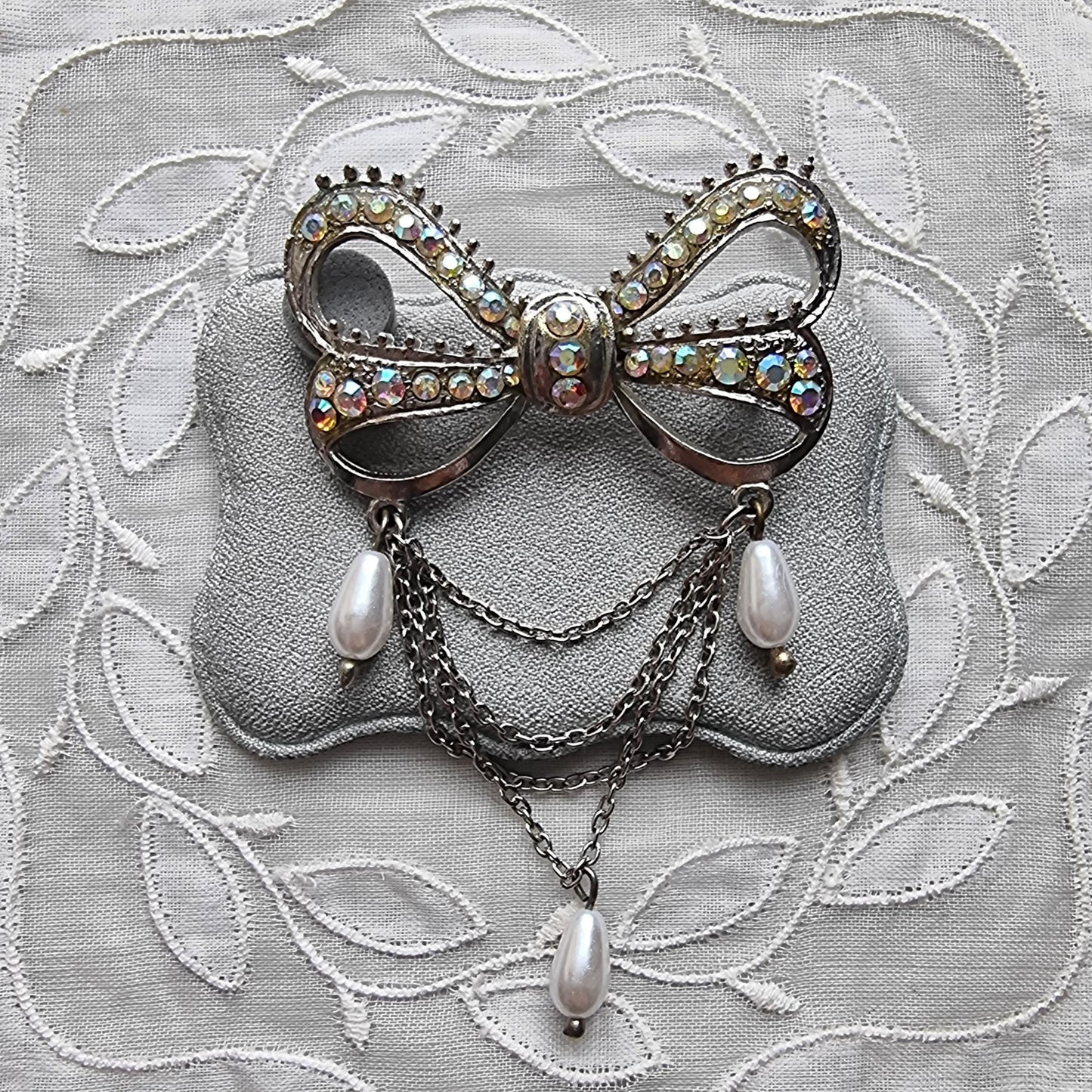 Brooch - Aurora Borealis Crystal Bow with Faux Pearl Chain Drops Brooch