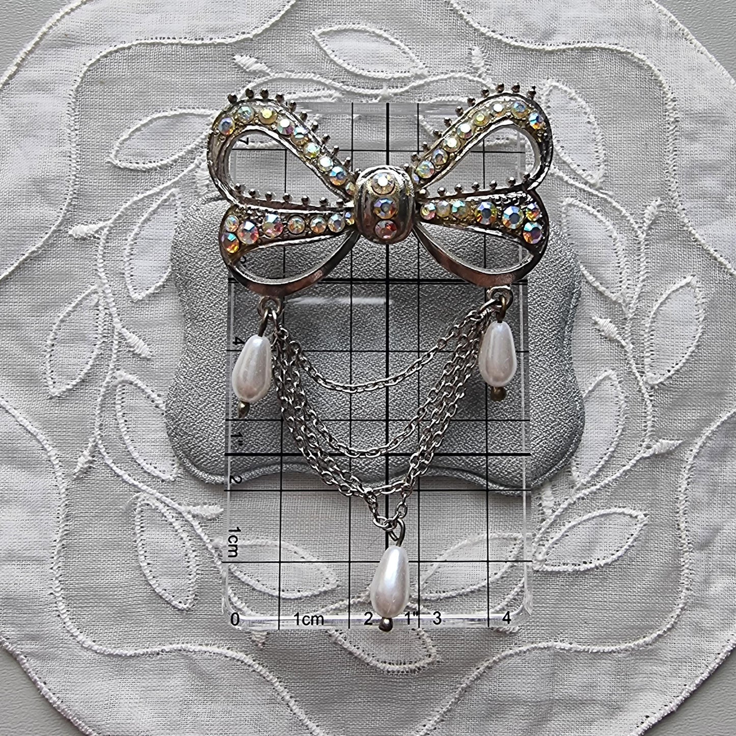 Brooch - Aurora Borealis Crystal Bow with Faux Pearl Chain Drops Brooch