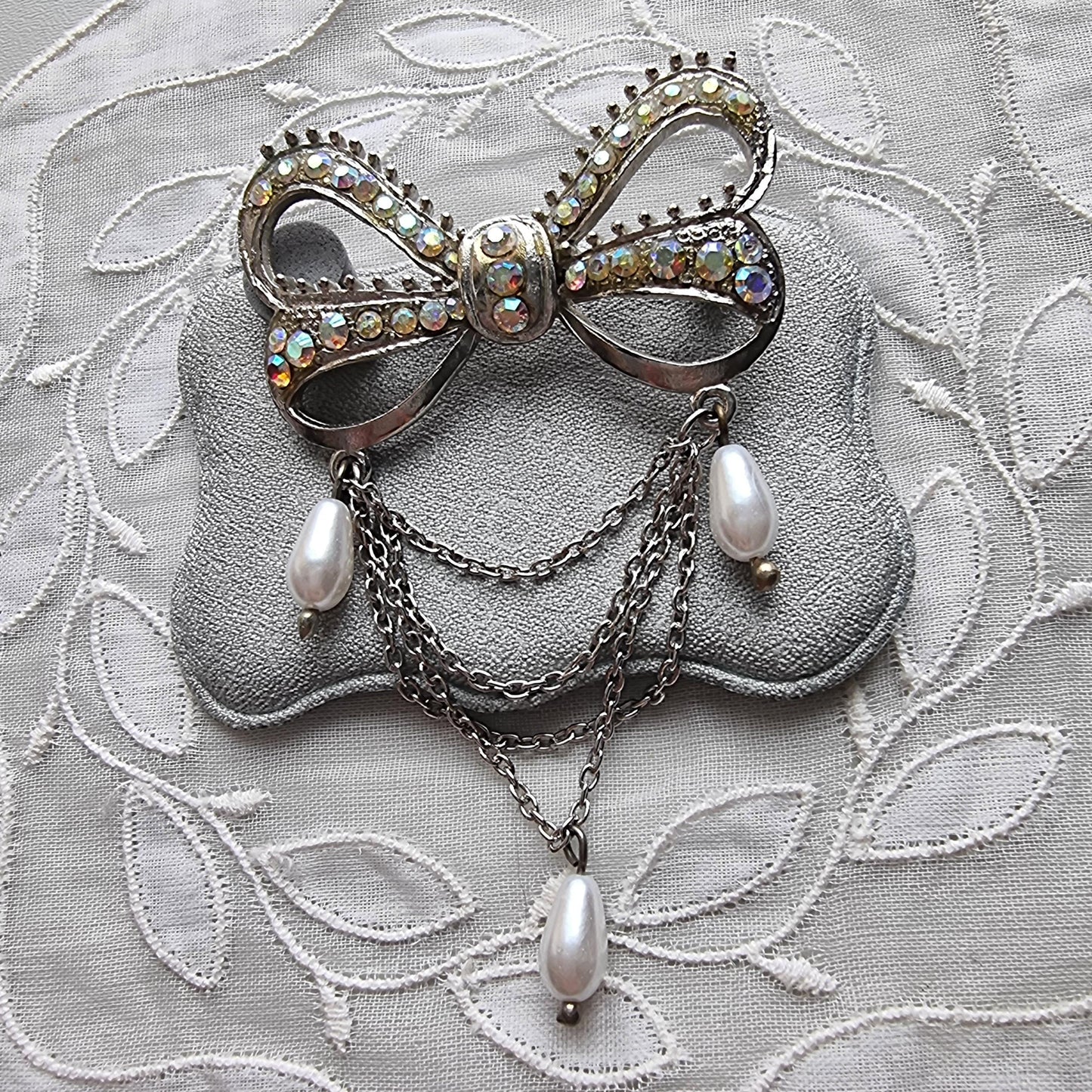 Brooch - Aurora Borealis Crystal Bow with Faux Pearl Chain Drops Brooch