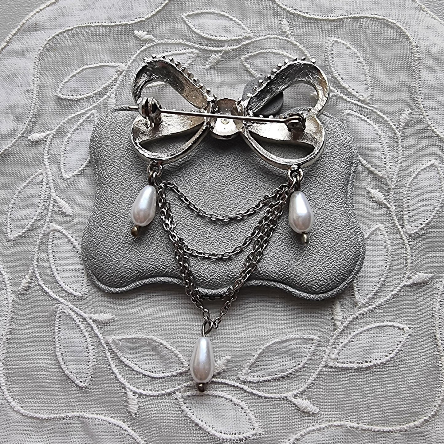 Brooch - Aurora Borealis Crystal Bow with Faux Pearl Chain Drops Brooch