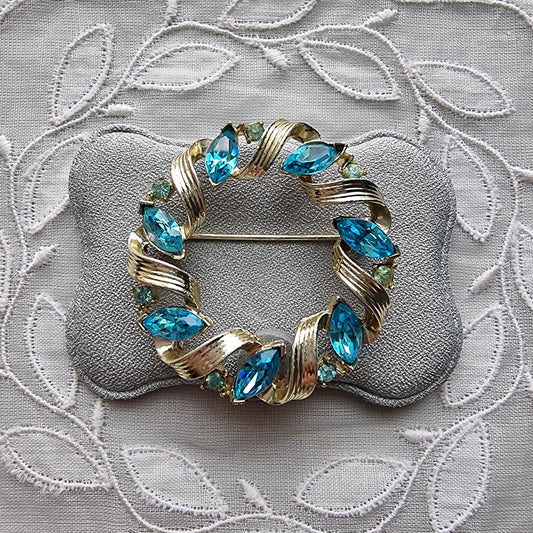 Brooch - Lisner Gold Ribbon Blue Crystals Wreath Brooch