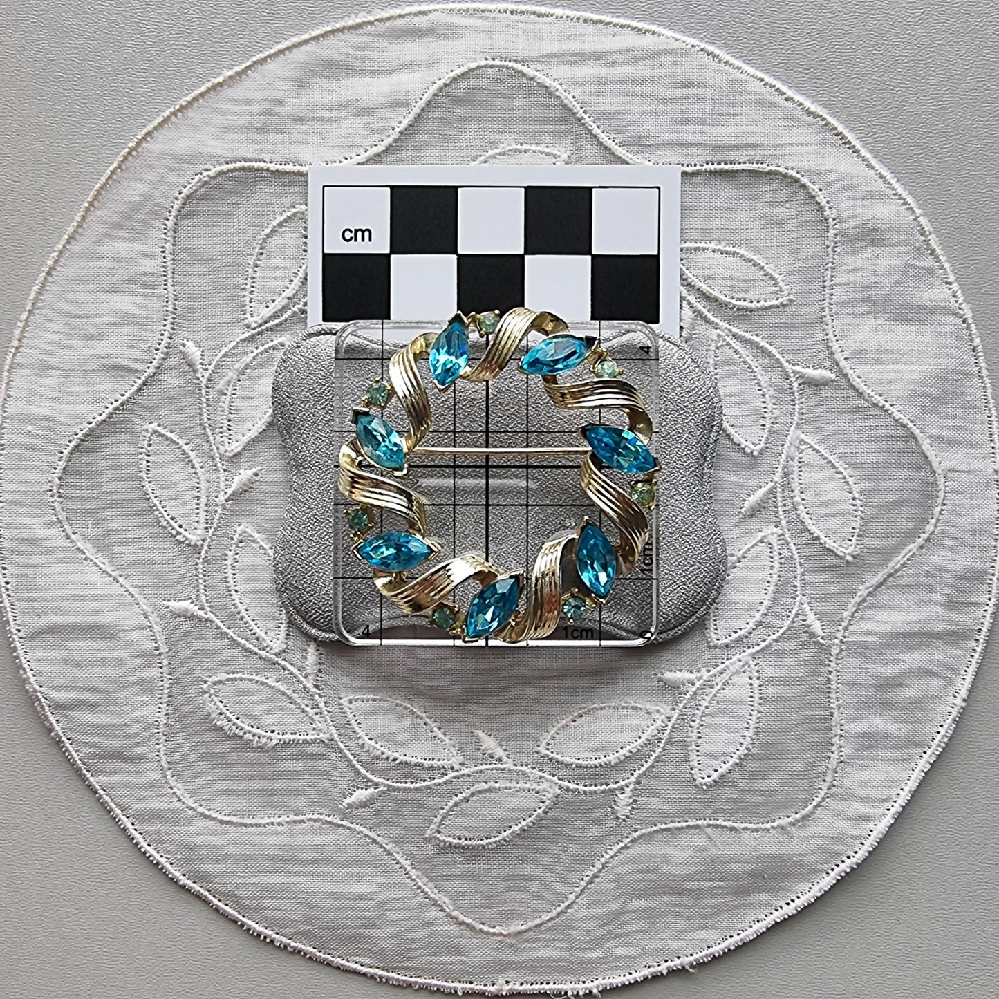 Brooch - Lisner Gold Ribbon Blue Crystals Wreath Brooch