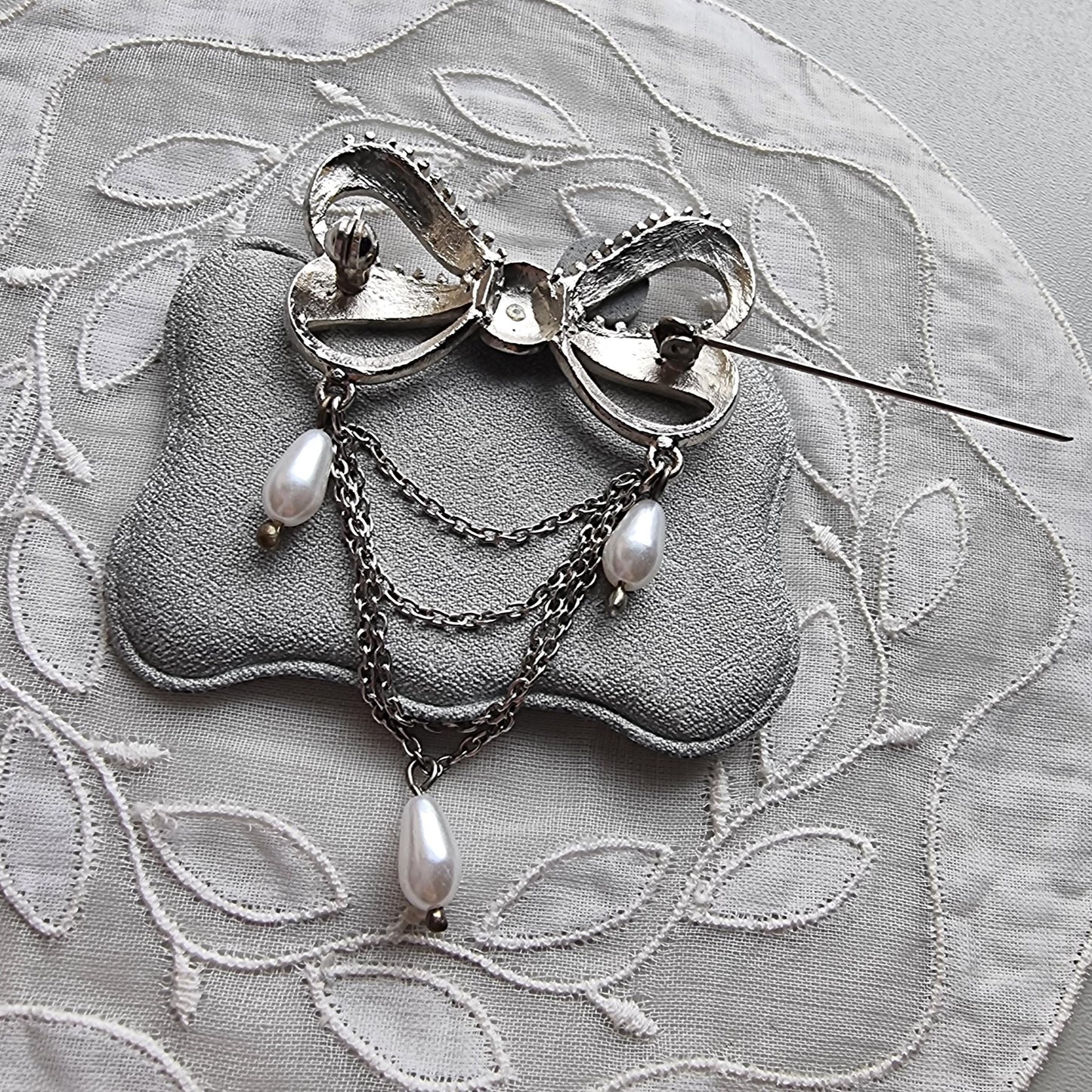 Brooch - Aurora Borealis Crystal Bow with Faux Pearl Chain Drops Brooch