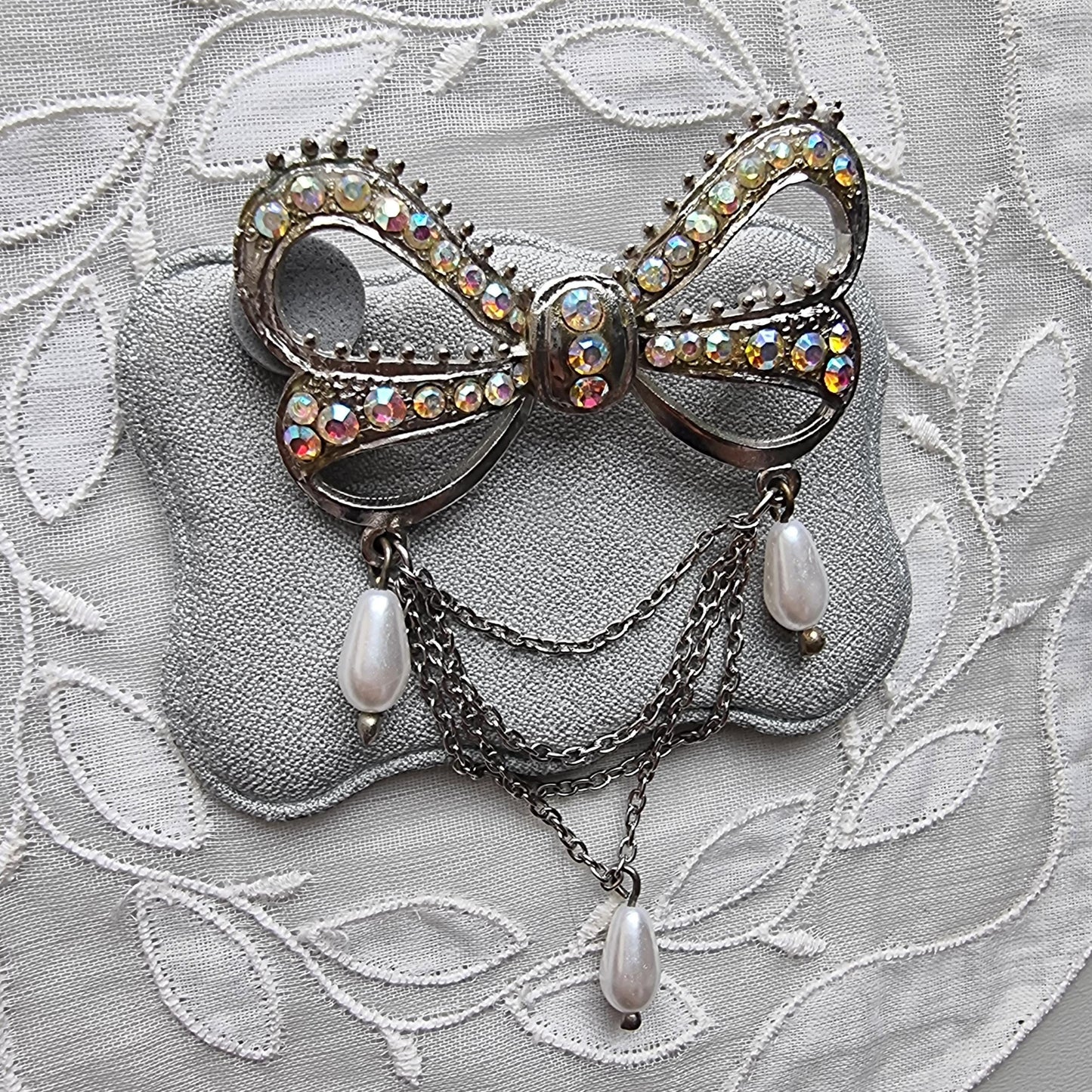 Brooch - Aurora Borealis Crystal Bow with Faux Pearl Chain Drops Brooch