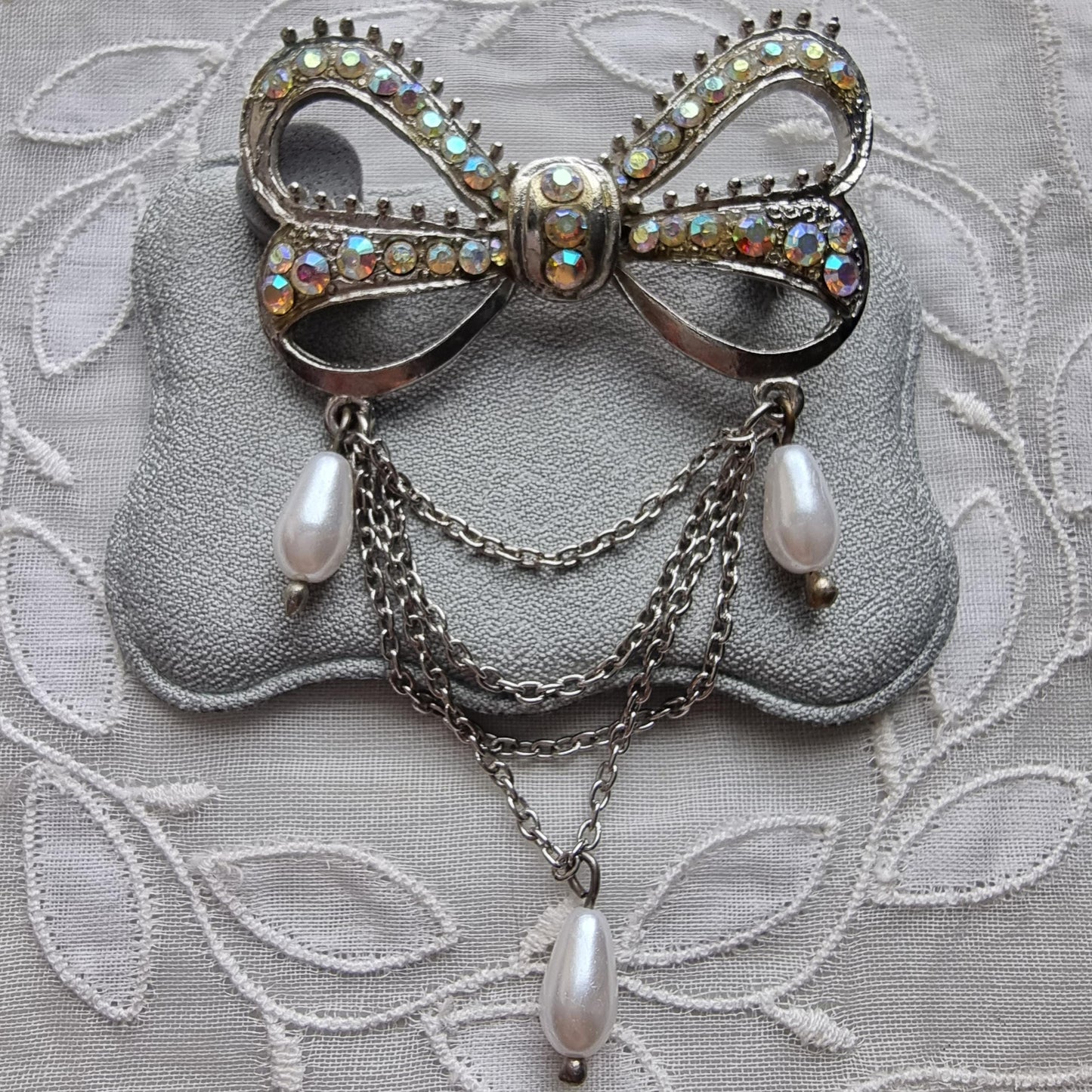 Brooch - Aurora Borealis Crystal Bow with Faux Pearl Chain Drops Brooch