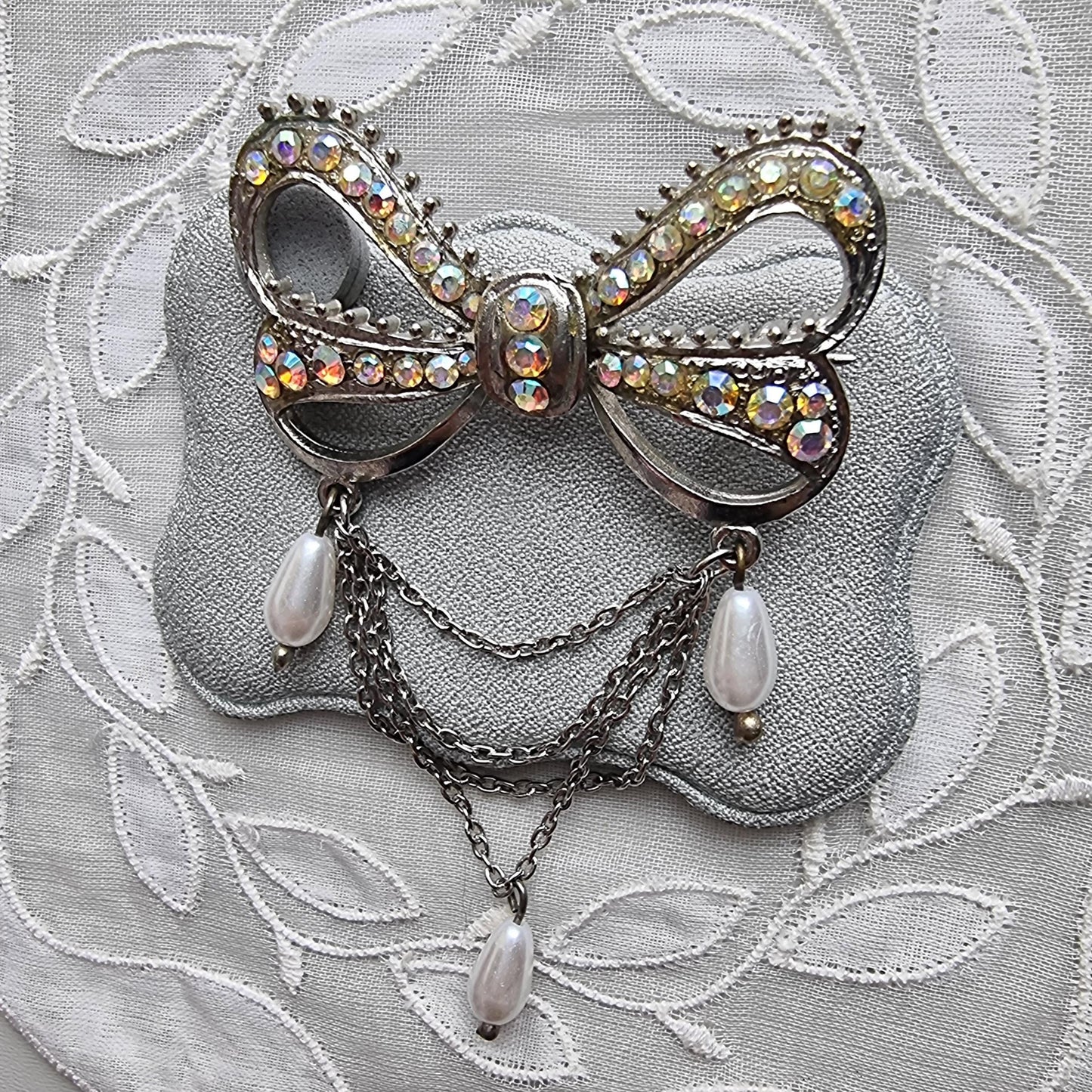Brooch - Aurora Borealis Crystal Bow with Faux Pearl Chain Drops Brooch