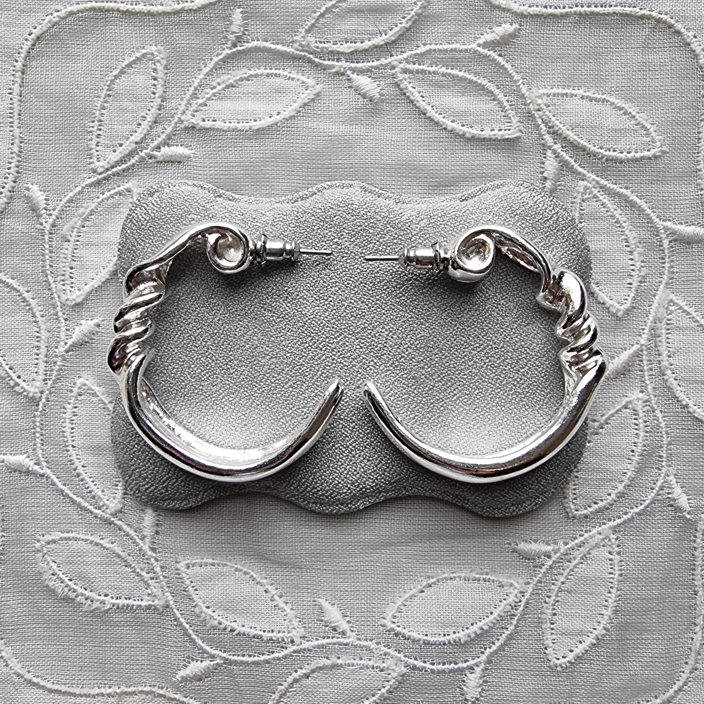 Posts - Silver Tone Twist Hoop Earrings
