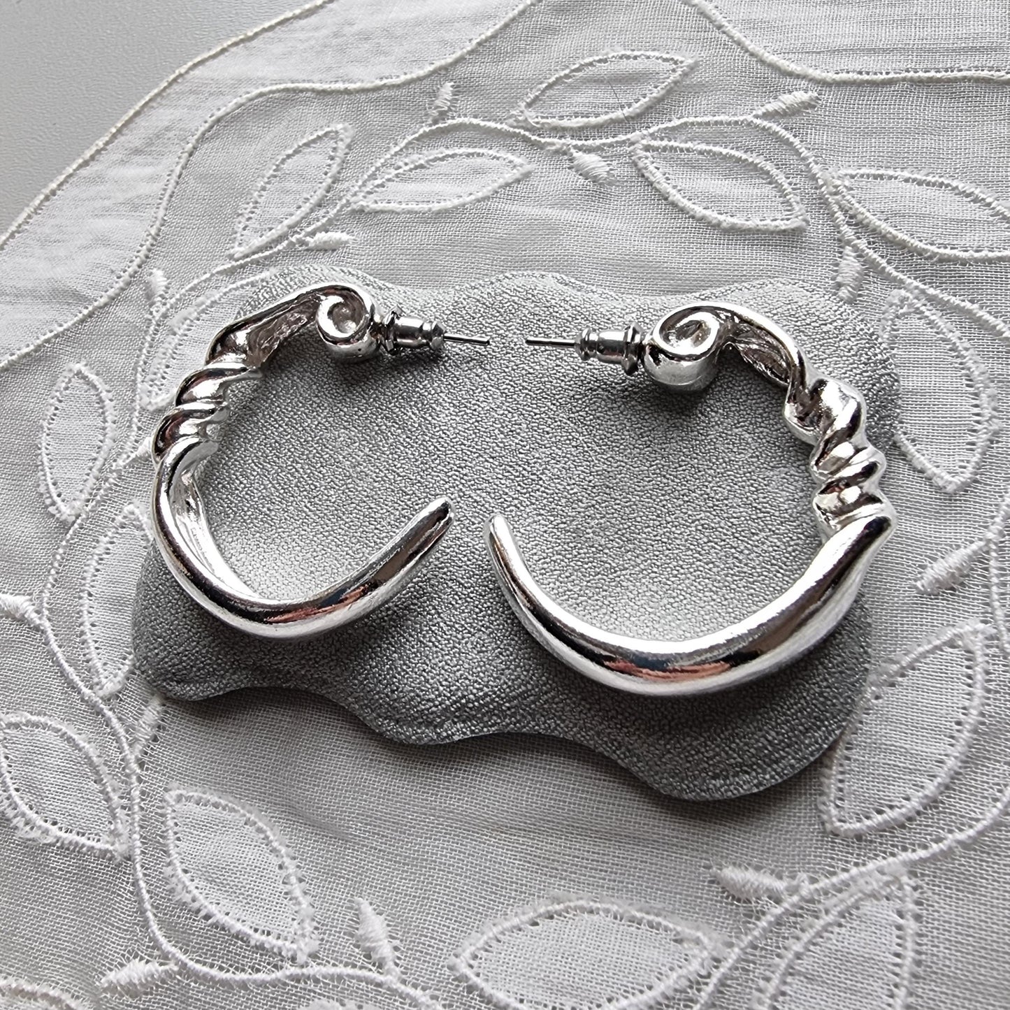 Posts - Silver Tone Twist Hoop Earrings