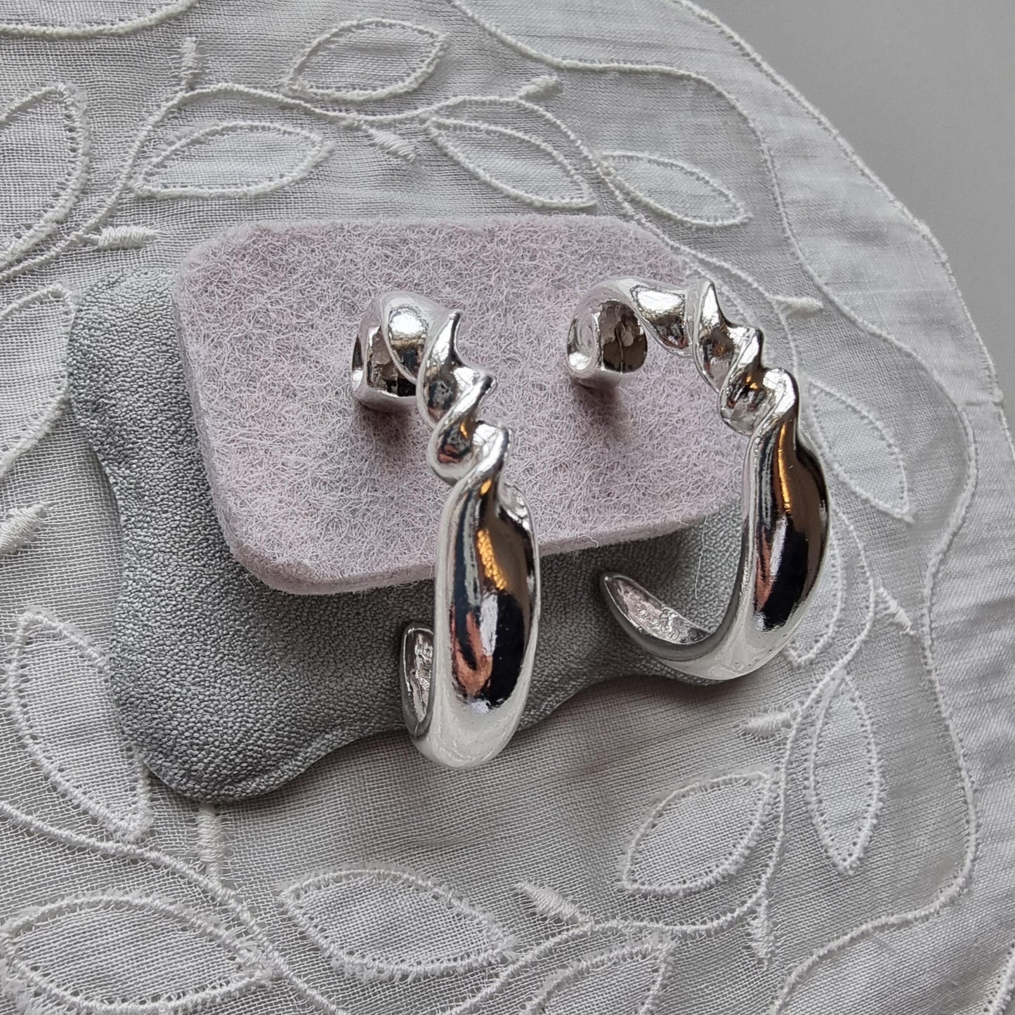 Posts - Silver Tone Twist Hoop Earrings