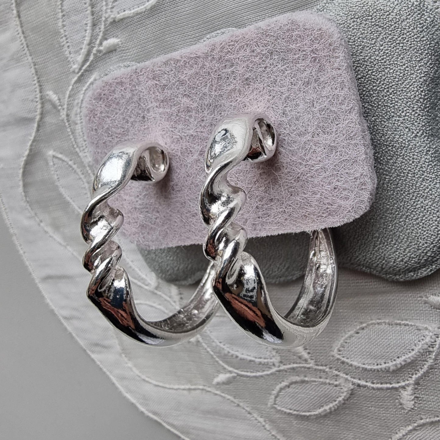 Posts - Silver Tone Twist Hoop Earrings