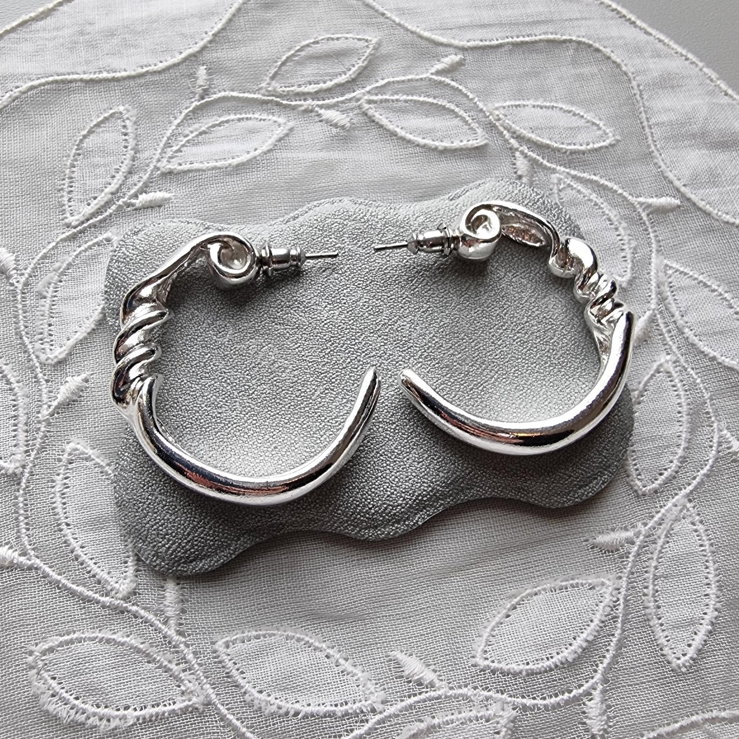 Posts - Silver Tone Twist Hoop Earrings