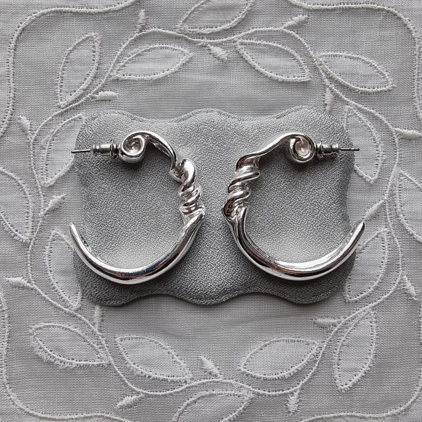 Posts - Silver Tone Twist Hoop Earrings