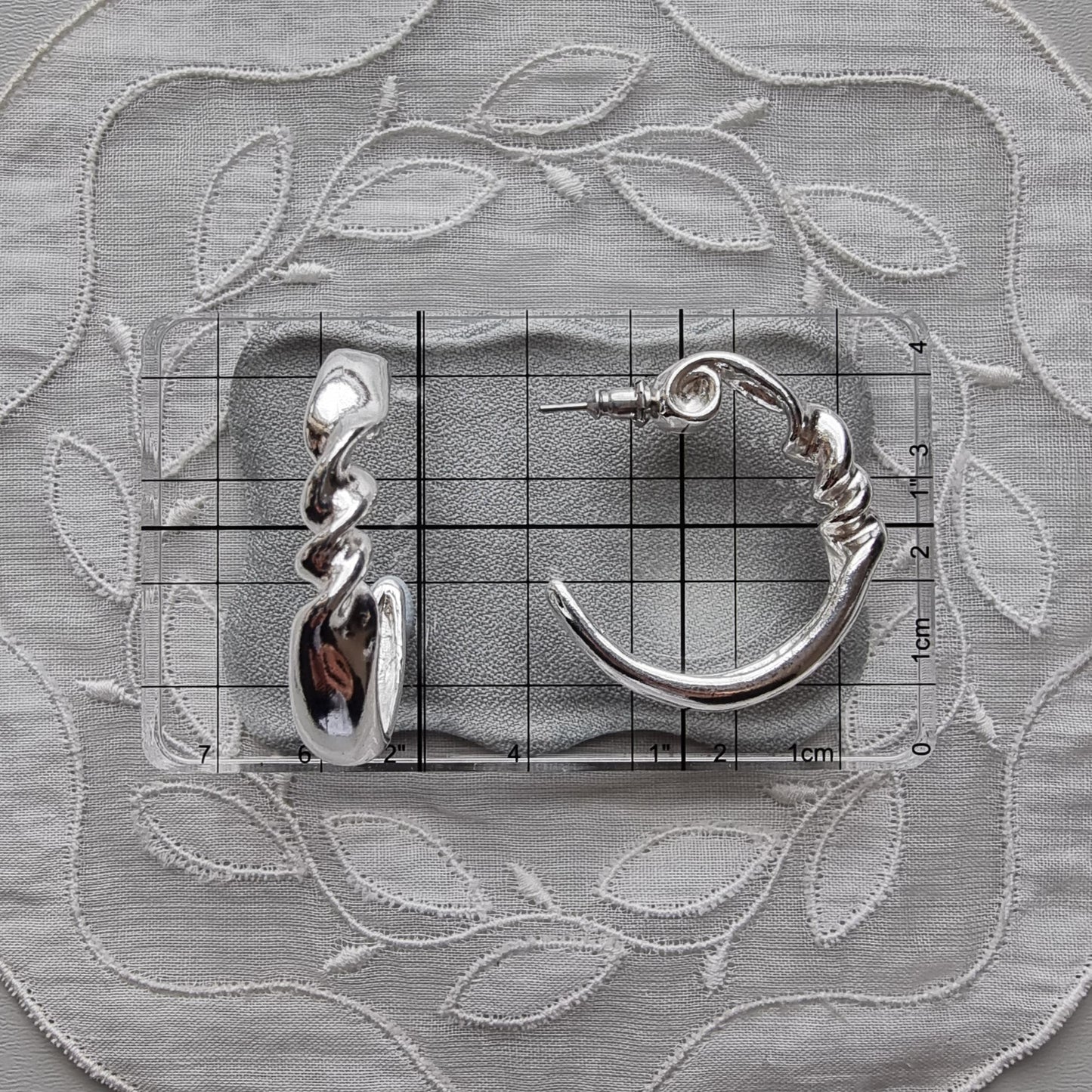 Posts - Silver Tone Twist Hoop Earrings